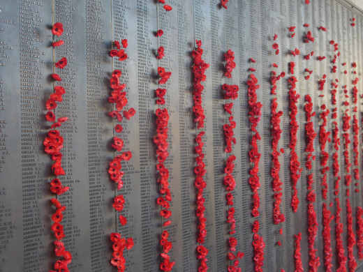 The Wall of Remembrance at the Australian War Memorial in Canberra lists the names of all Australians who died in war. The Poppies are a symbol of the armistice as they began to flower at that time in the North of Belgium and France.