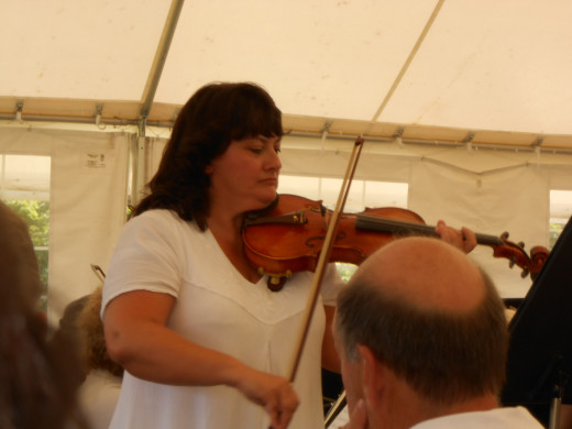 My friend Christine, (#9 below), at a solo at her violin concert that my husband and I attended.