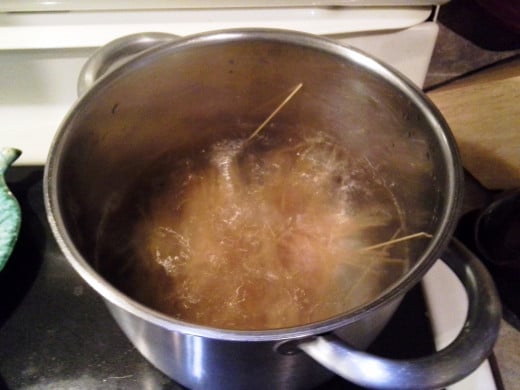 Step Seven: When boiling, drop your pasta in the water
