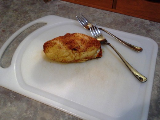 Step Nine: When finished cooking, transfer your chicken breast to a cutting board