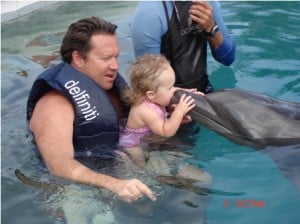  Dolphin therapy is believed to have a therapeutic effect on children with Down syndrome. While it is not a cure, Dolphin therapy can enhance their healing process. Image used with permission of Patricia Ann Talley, editor of imagine-mexico.com
