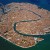 Venice, a city sited on a group of 118 small islands separated by canals and linked by bridges as seen from above. Venice, a city sited on a group of 118 small islands separated by canals and linked by bridges as seen from above.