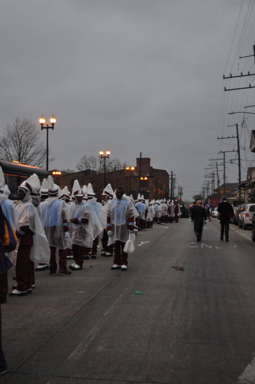 2013 was a wet, windy, cold day, but as long as there's no lightning, the show must go on. These kids were wrapped in plastic and ready to march.