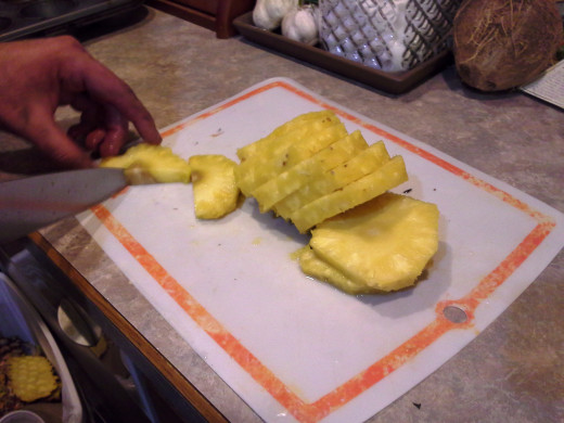 Step Five: Slice your pineapple into thick round slices