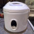 Step Fourteen: Cook it in your rice cooker until done (We put in a little extra water than instructed)