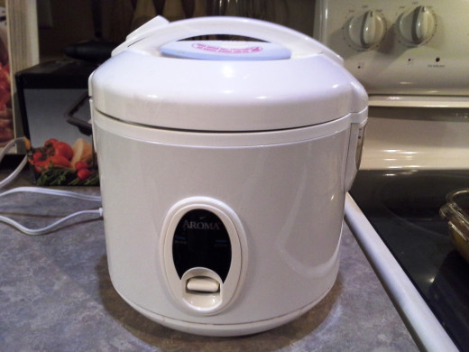 Step Fourteen: Cook it in your rice cooker until done (We put in a little extra water than instructed)