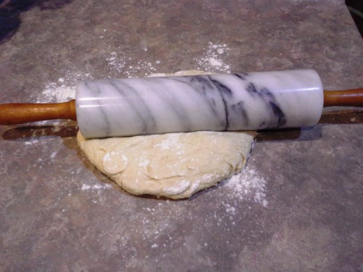 Step Eleven: Roll your dough out thin and flat with a rolling pin