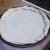 Step Twelve: Transfer your dough to your pizza pan and roll the edges in to create your pizza crust