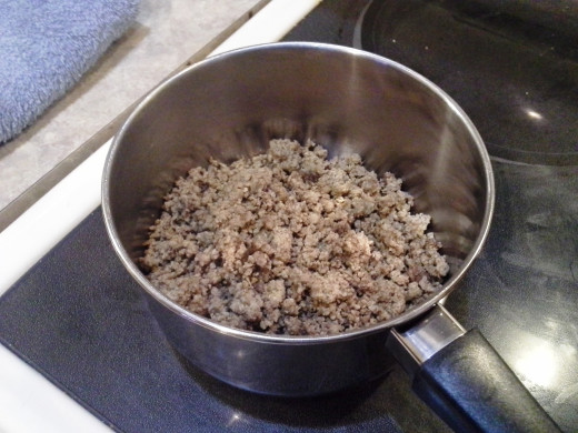 Step Four: Pour your defrosted hamburger meat into a medium sauce pot