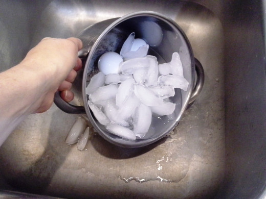 Step Seven: Let the eggs sit in the ice water bath for at least 30 minutes to an hour, then drain