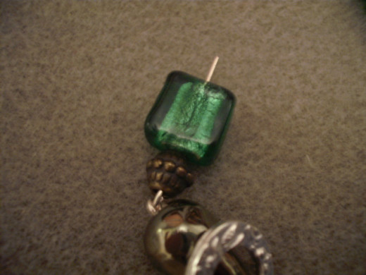 Place beads on the second headpins.
