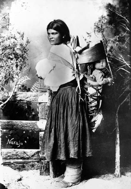 Navajo woman and child, circa. 1880-1910.