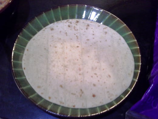 Step Nine: Now we will assemble our burritos; Lay out your tortilla first