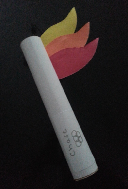 Invitations are made to look like torches.