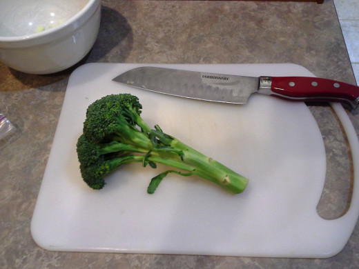 Step Fifteen: Pull out one head of broccoli onto your cutting board