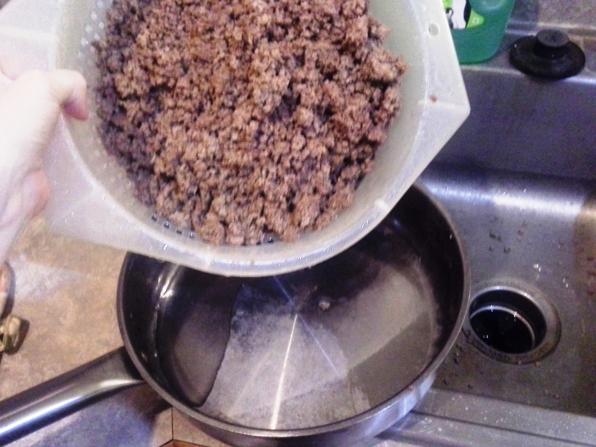 Step Twelve: Pour it back into your cooking pot, after rinsing the pan as well, and set it back on the stove