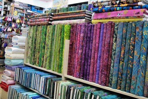 Shelves of fabric line the walls of JoAnn's.