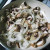 As the garlic starts to change color, add the mushrooms and onions As the garlic starts to change color, add the mushrooms and onions