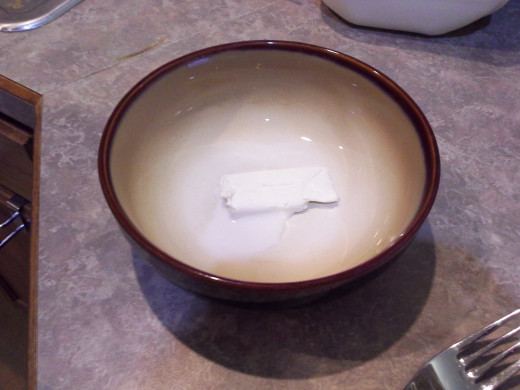 Step Three: Add your milk to the bowl with your cream cheese