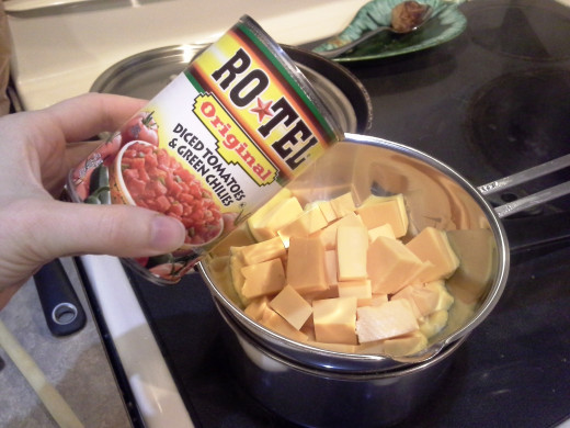 Step Seven: Pour it into your double broiler with your Velveeta