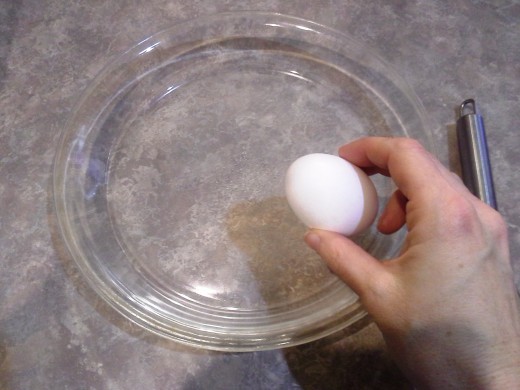 Step Four: In a semi-shallow dish on the side, crack an egg