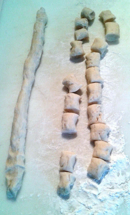Roll the risen dough out and then slice into 2-inch pieces