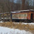 Old train cars resting in peace and outlined with snow. Old train cars resting in peace and outlined with snow.