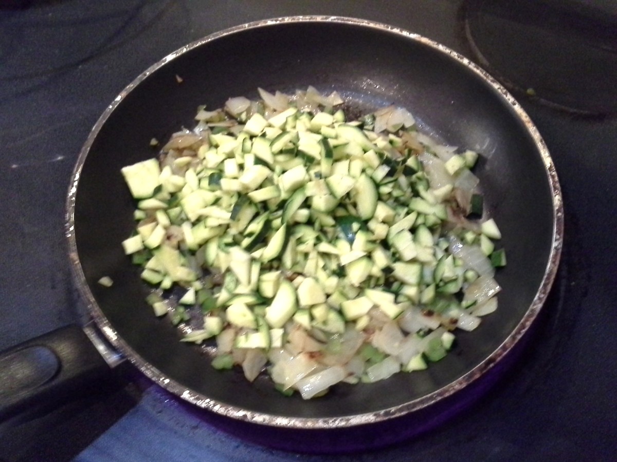 Step Nine: Now chop and add your zucchini (We had tons of it in our fridge and it's relatively tasteless amongst all of these other flavors. Why not get the nutrients if I can?)