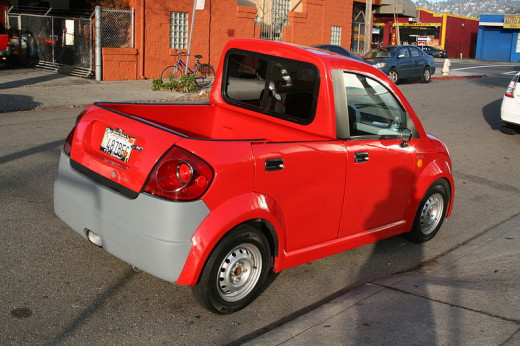 Golf Carts and small electric cars (NEVs) like this one are everywhere.