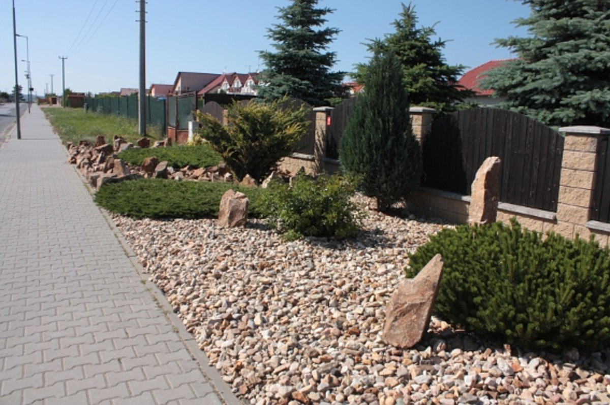Pebbles can replace grass as a creative way to beautify your landscape.