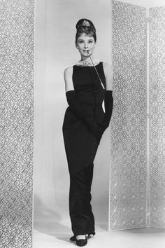 Famous still from "Breakfast at Tiffany's," great example of that classic Audrey style, a slim fit, floor-length shift.  Gloves are not needed for a modern take!