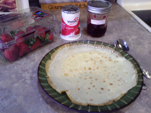 Step Twenty: When you're ready, move a crepe over to your plate