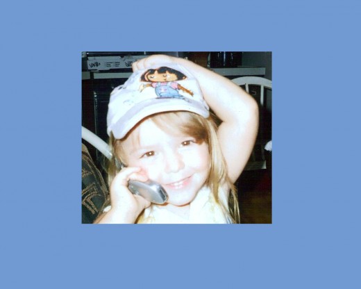 My beautiful Piper. (Doing what us girls do best... TALKING ON THE PHONE!)