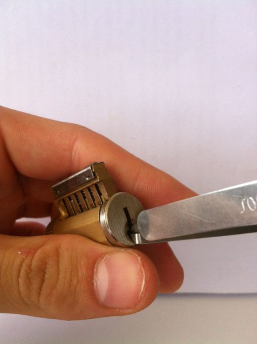 Push the Pick right to the back of the lock with the yip facing upwards