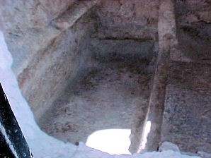 The interior of a tomb for the placement of the body.