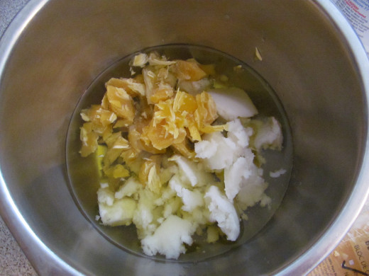 Mix coconut oil, olive oil and beeswax together in a double boiler