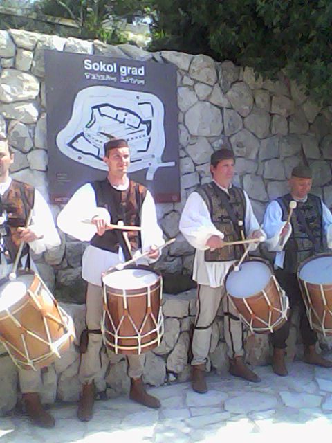 Men playing music with the traditional drums