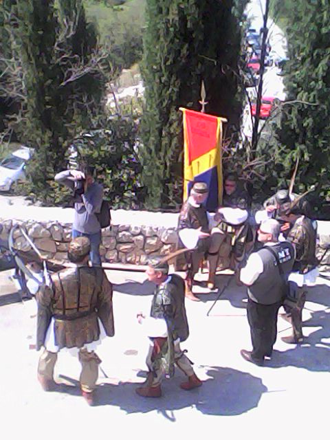 Men ready to shoot their arrows