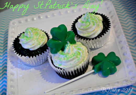 Mint chocolate cupcakes topped with chocolate shamrock candy molds will be a delicious treat to have on your dessert table this St.Patrick's Day.