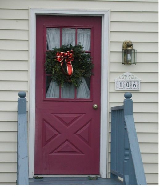 Live picture of evergreen wreath that was handed made by Gardener Den is a great addition to any ones holidays decorations.