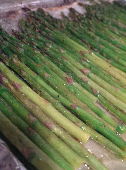 this is what your asparagus should look like after it comes out of the oven - not too black or shriveled. It should still look juicy and green!