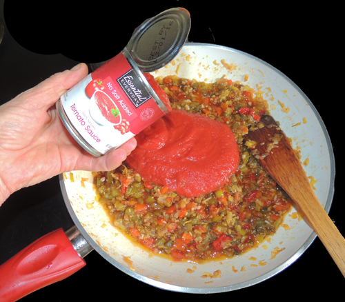 add tomato sauce, and stir