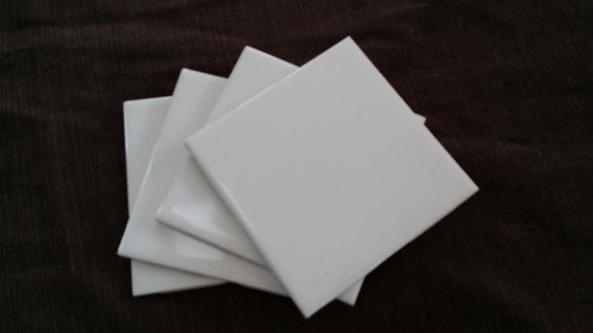 Plain white ceramic tiles are a bargain for this DIY photo coaster project