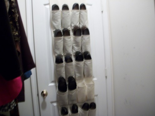 One way to store shoes is in an over-the-door storage bag like this one. It holds 10 pairs of shoes.