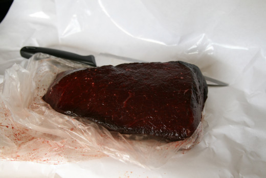 A big chunk of bloody, fresh whale meat