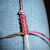 Continue making square knots making sure the core cord stays tight and doesn't stick up between the knots.