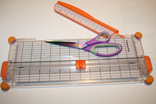 Have a pair of scissors and paper trimmer ready to trim and cut.