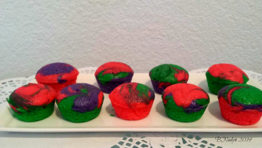 Serve these mini rainbow cupcakes on a platter at the party for a colorful table setting. I did not want to put icing on these since most of the rainbow coloring shows at the top.  They were still tasty and my kids ate them!