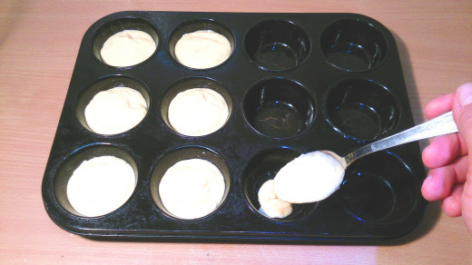 Scoop 2 tablespoons of prepared mixture into each mini muffin cup. (fill each cup about halfway).