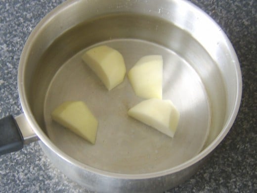Chopped potatoes ready for boiling